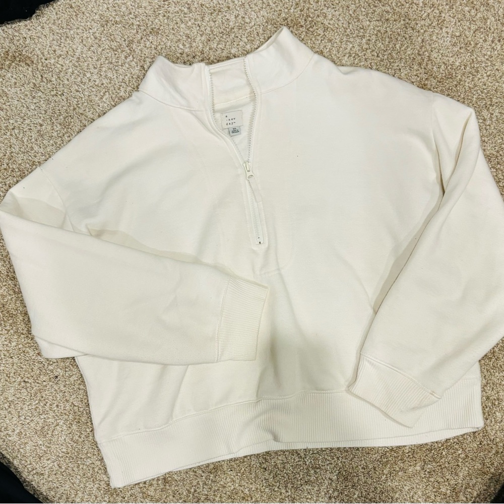 A new day cream scuba sweatshirt